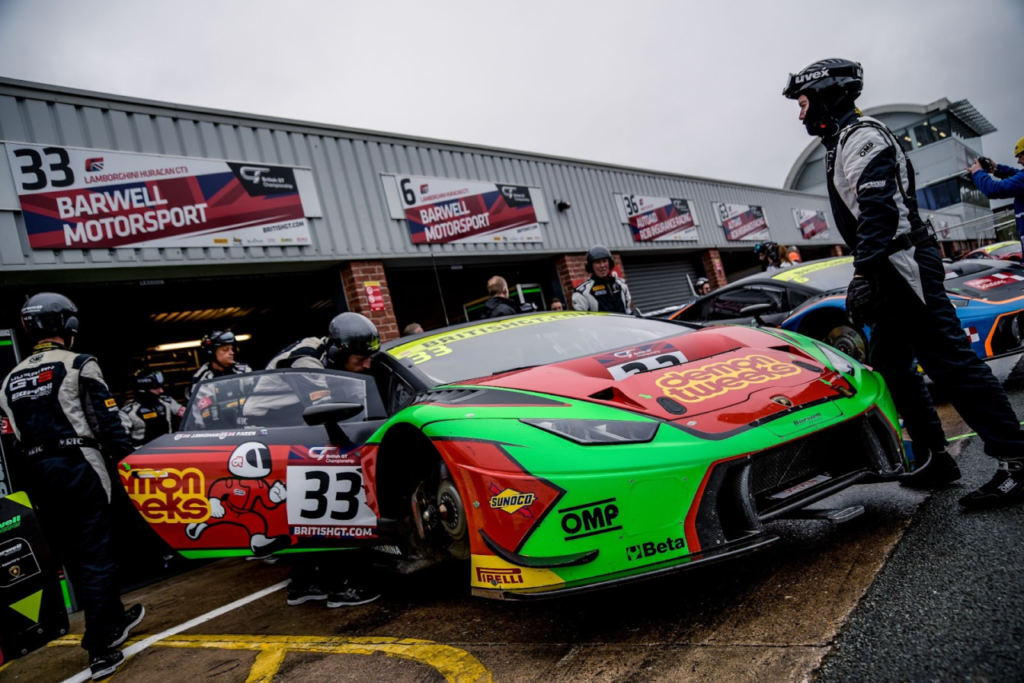 Race Driver Refuels During Pit Stop: Boosting Performance on the Track