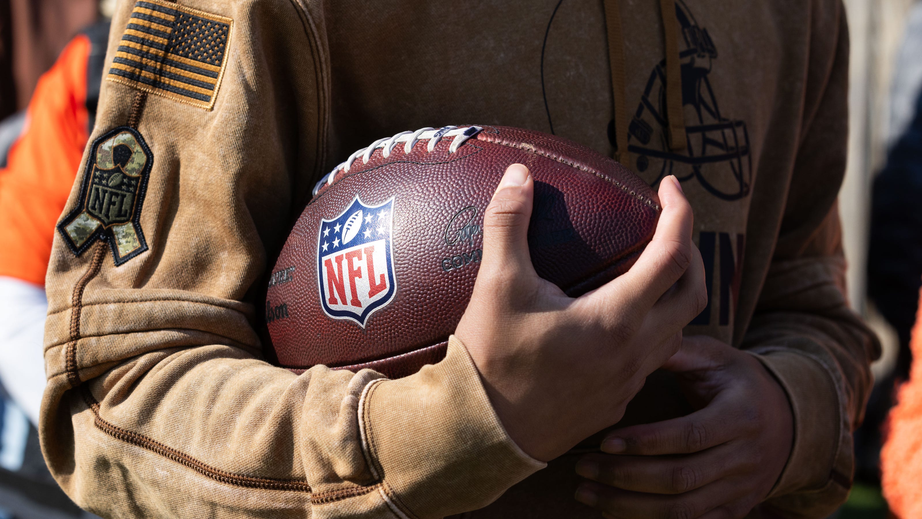 Why Are NFL Staff Wearing Brown Camo? Simple Explanation Here