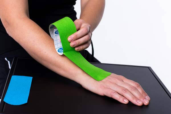 Got Tennis Elbow? Learn How to Strap It for Support